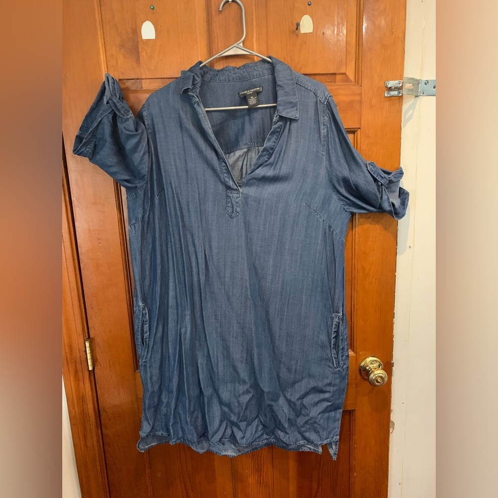 Women’s long denim shirt. 3/4 sleeves. Size 2X. Worn once. Needs an iron.